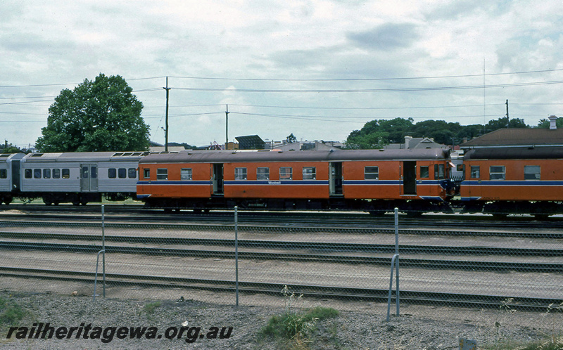 P23396
ADGV class 611, other railcars, tracks, house roofs, Claisebrook ER line, side view
