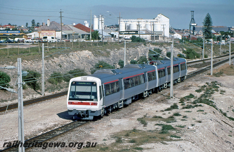 P23408
AEB class 304, AEA class 204, EMU set 04, overhead wires, white silos in background, Leighton, ER line, end and side view
