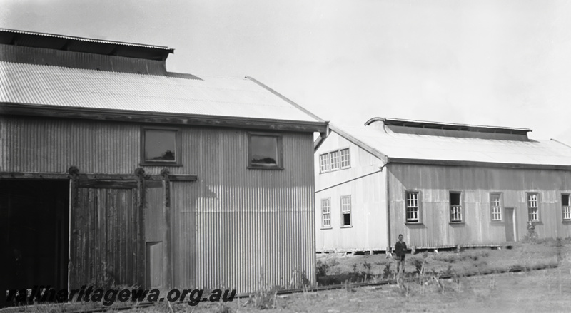 P23447
Sheds, lone figure, Hopetoun, HR line, ground level view
