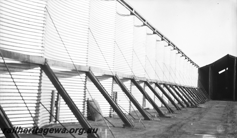 P23473
Wheat bin, supports, shed, Korrelocking GM line, ground level view
