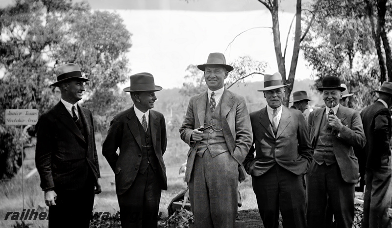 P23477
Ambulance Competition special train, suited and hatted judges, bush setting, Sawyers Valley, ER line
