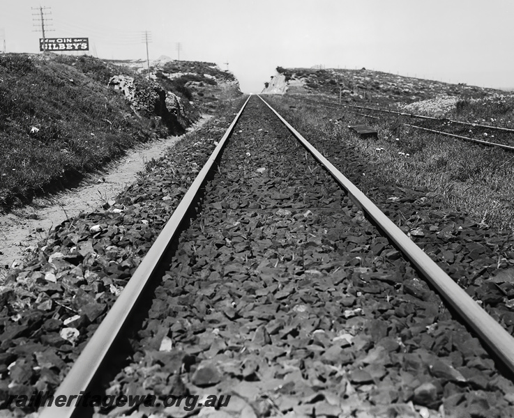 P23494
Track after reballasting, cutting, advertising sign, Mosman Park, ER line, track level view
