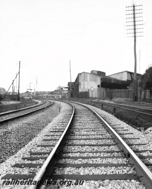 P23495
Track prior to reballasting, buildings, bracket signals, Mosman Park, ER line, track level view
