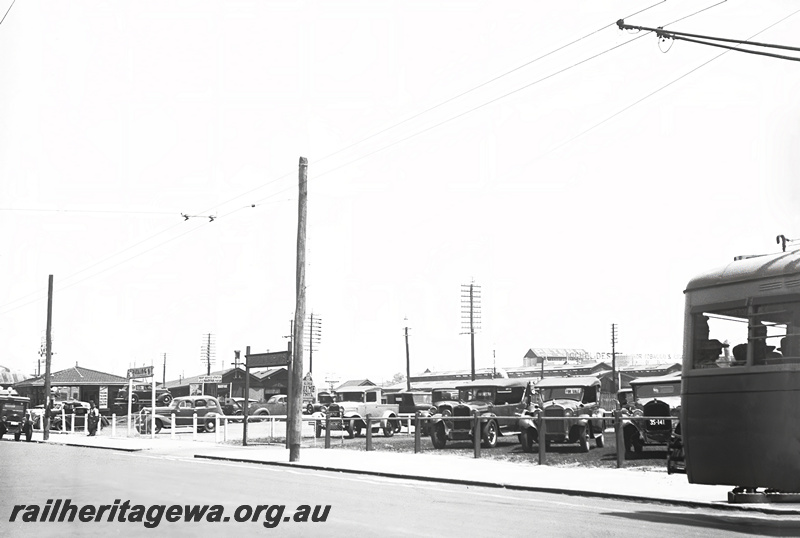 P23497
Rear of trolley bus, motor vehicles, north side of Wellington St, near William St, Perth, ER line, road level view
