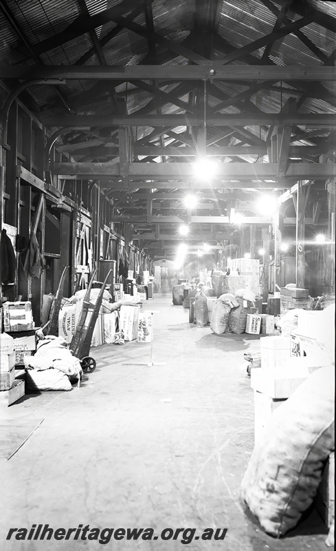 P23506
Interior view of No 1 Goods Shed, train, goods, trolleys, Perth ER line, ground level view
