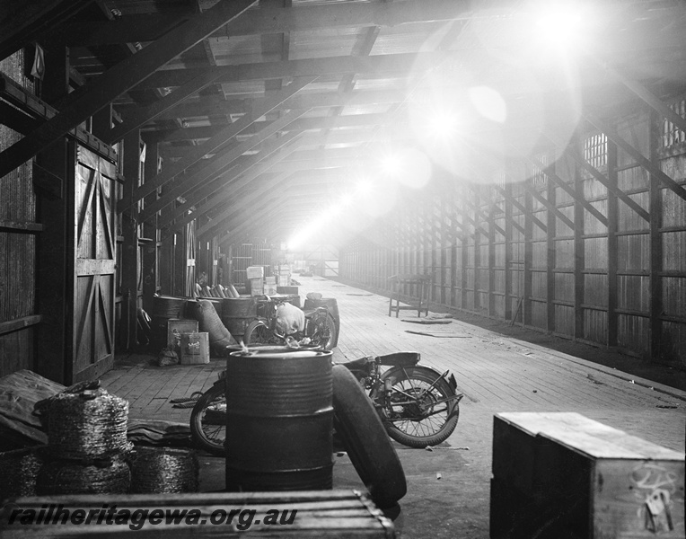 P23509
Interior view of No 4 Goods Shed, motor cycle, Perth ER line, floor level view
