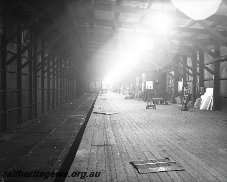 P23511
Interior view of No 4 Goods Shed, track, empty platform, Perth ER line, platform level view
