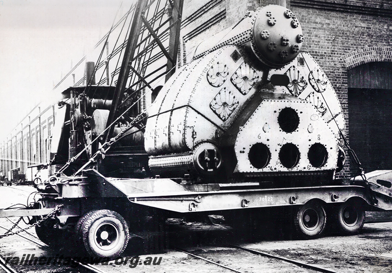 P23525
Yarrow class boiler (for HMAS Corvettes) being loaded by steam crane, Midland Workshops 
