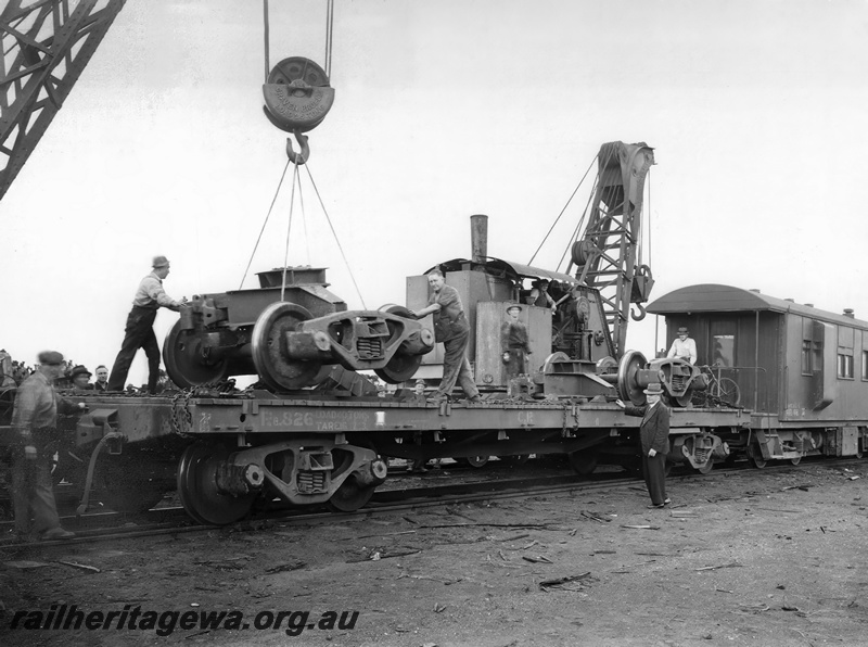 P23545
Parkeston - transfer of ASG locomotive G 32 to narrow gauge wagon.
