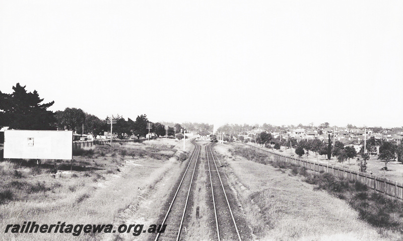 P23590
Station, steam train at platform, signals, Daglish, ER line, elevated view looking east
