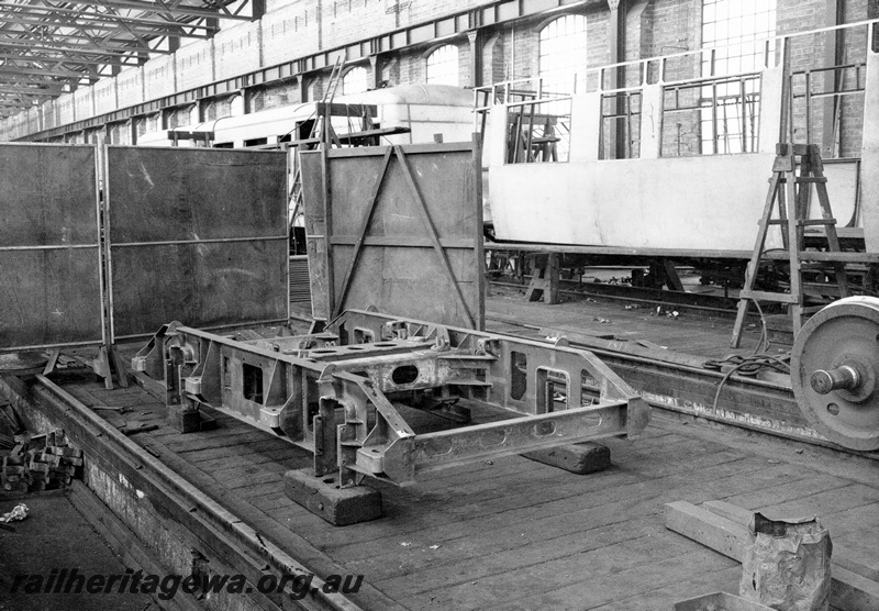 P23843
ADT class trailer under construction, bogie from electric weld, Midland workshops, Midland, ER line, interior view
