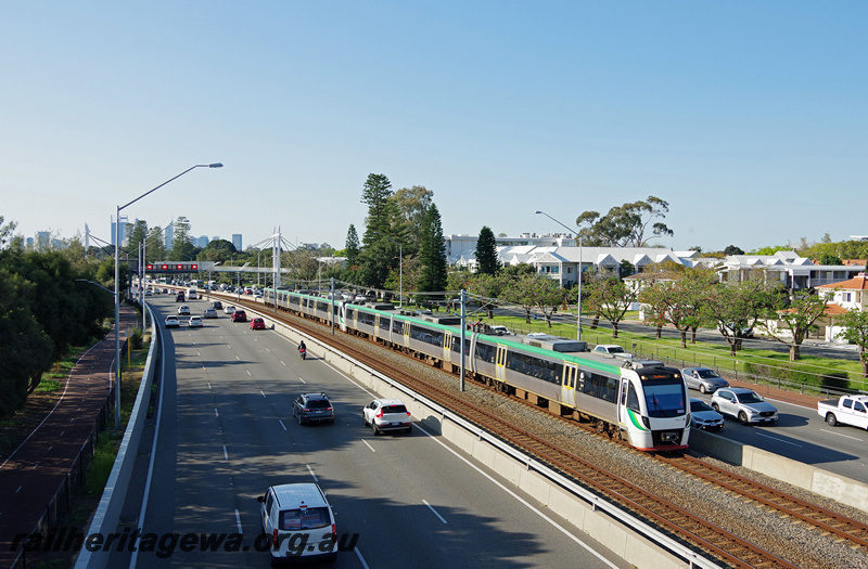 P24104
B series railcar 5055, leading B series EMU set 55, and another B series set, freeway, Como, Mandurah line, side and front view
