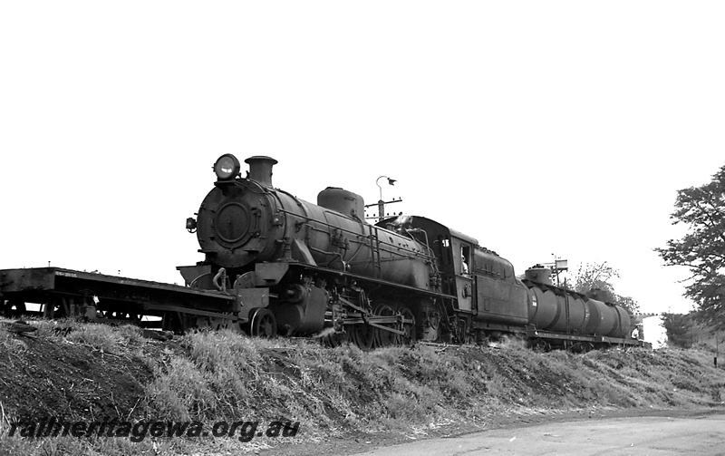 P24231
W class 297, shunter's float, tanker wagons, Bridgetown, PP line, front and side view
