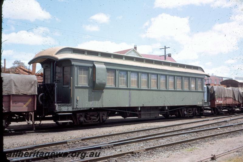 T00056
AG class 39 Gilbert carriage with all over green livery and guards lookouts at end nearest camera, end and side view
