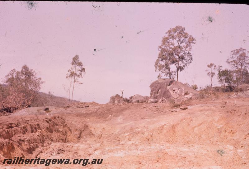 T00315
Standard Gauge construction, Avon Valley line, granite outcrop ahead of cutting at approx. 40m peg
