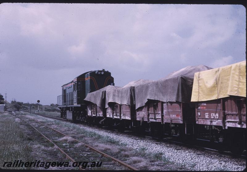 T01939
RA class 1909, tarpaulined wagons, goods train, rear view
