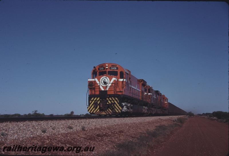T02896
MT Newman Mining Alco locomotives M636 class 5491, M636 class 5487 and M636 class 5454, iron ore train.
