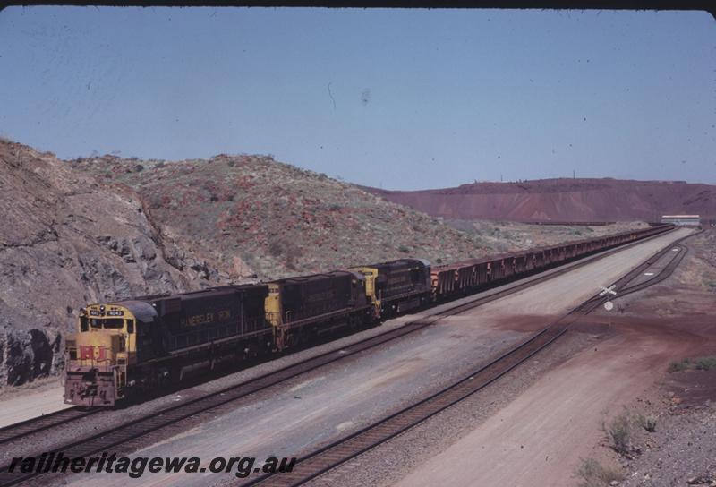 T02904
Hamersley Iron Alco locomotives M636 class 4043, C628 class 2001 and M636 class 4053 on loaded iron ore train.
