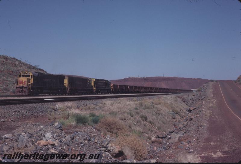 T02905
Hamersley Iron Alco locomotives M636 class 4043, C626 class 2001 and M636 class 4053 on loaded iron ore train.
