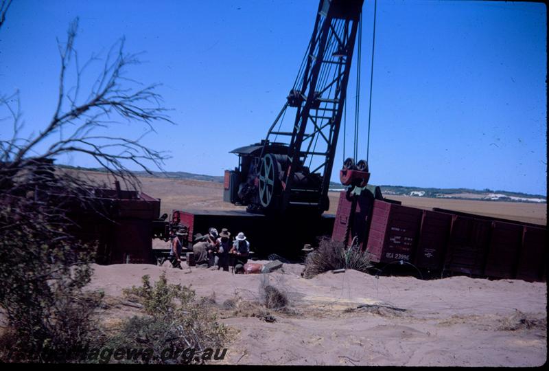 T02970
Nine of ten photos of a derailment at Dongara, MR line, Steam breakdown crane No.23 lifting derailed wagons
