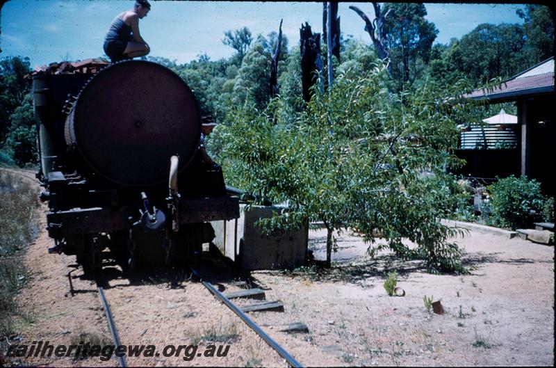 T03064
Filling bush camp water tank wagon at Asquith
