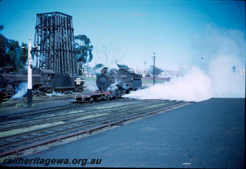 T03181
FS class locos, one with high sided tender, water tower, Northam, shunting
