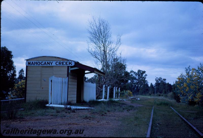 T03667
Portable shelter shed, station building, Mahogany Creek, M line, trackside view showing remains of the platform picket fence
