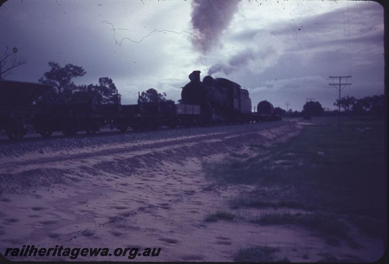 T03946
FS class, on the site of the Peel Estate Railway, on ballast train on the new Kwinana to Jarrahdale line 
