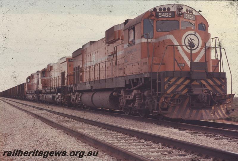 T04241
 Mount Newman Mining Alco C636 class 5462 and two sisters with a loaded train, Port Hedland - Newman railway, BHP line,
