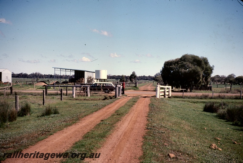 T05096
Railway formation, now rural scene, hay barn, water tank, road, near Lake Clifton and Waroona, SWR line
