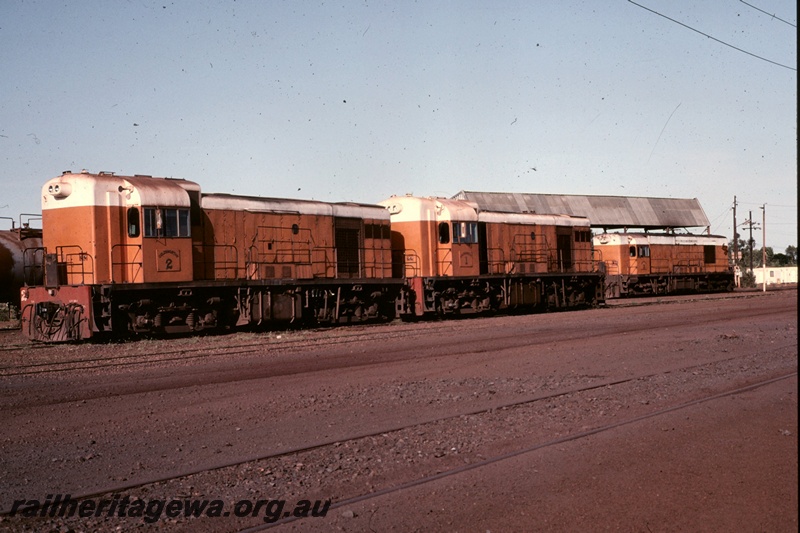 T05171
Goldsworthy Mining (GML) A and B class locomotives in the yard at Finucane Island.
