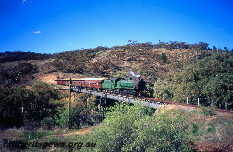 T05415
W class 933, on excursion train, crossing steel bridge over river, side and front view from one side of bridge, Pichi Richi Railway, South Australia
