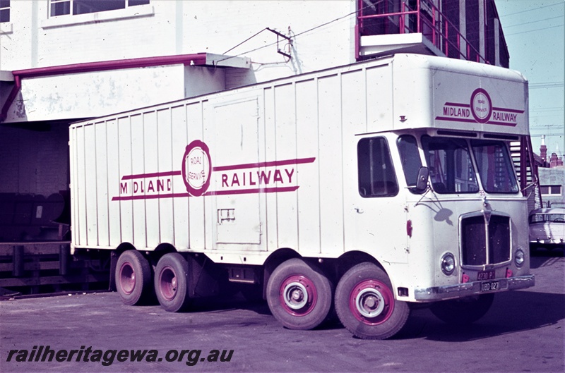T05466
Midland Railway (MRWA) truck 33, with plates 4230P and UBD027, at Midland Railway Road Services centre, William and Newcastle Streets Perth, side and front view 
