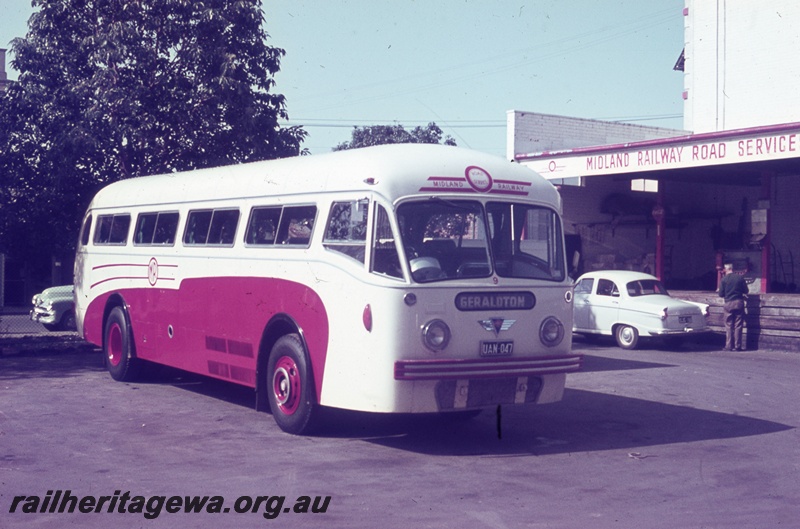 T05468
Midland Railway(MRWA) bus bound for Geraldton, UAN 047, Morris Major motor car, bystanders, at Midland Railway Road Services Centre, William and Newcastle Streets Perth, side and front view
