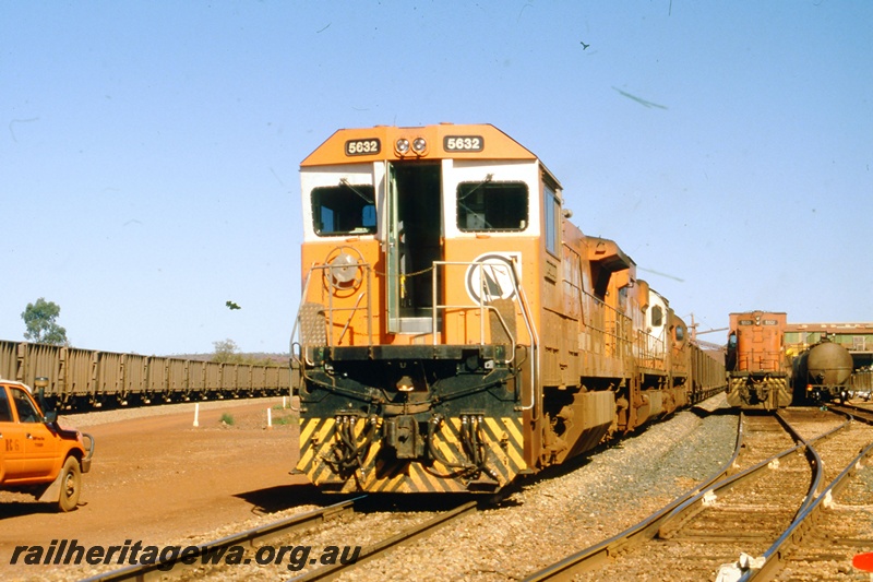 T05533
Mt Newman Mining's 5632 leads a loaded iron ore train  at Newman.
