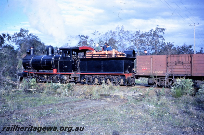 T05578
Donnelly Sawmills  Yx class 86 approaches Yornup from Donnelly River mill. Side view of locomotive and wagon. 
