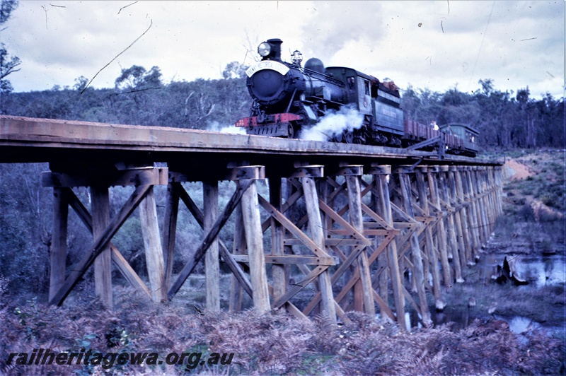 T05595
Cs class 270 "Black Butte" crossing Murray River near Asquith on Banksiadale timber line. This is an ARHS outing. SWR line.   

