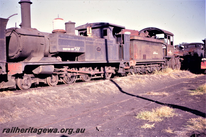 T05605
B class (steam locomotive) waiting to be cut up at midland Junction Workshops. ER line.
