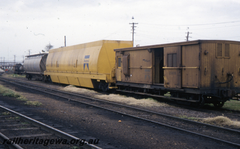 T05718
ZS class  509 brakevan, XO class  (wood chip) wagon and XF class  (alumina ) wagon at Bunbury. SWR line. 
