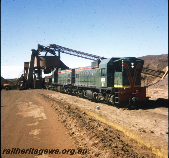 T05728
A class 1513 & A class 1514 loading iron ore at Westmine. TW line
