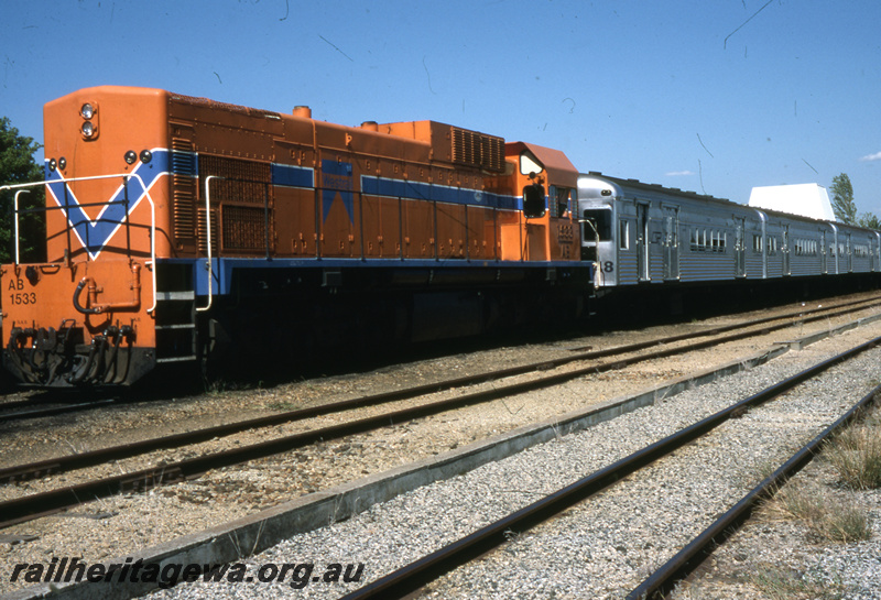 T05736
AB class 1533 hauling passenger train of former Queensland Railways carriages.  ER line.
