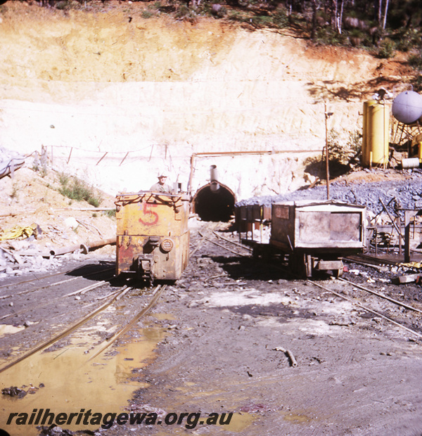 T05762
Canning Dam - dam wall extension - Gemco locomotive, ARHS outing showing tunnel in the dam wall.
