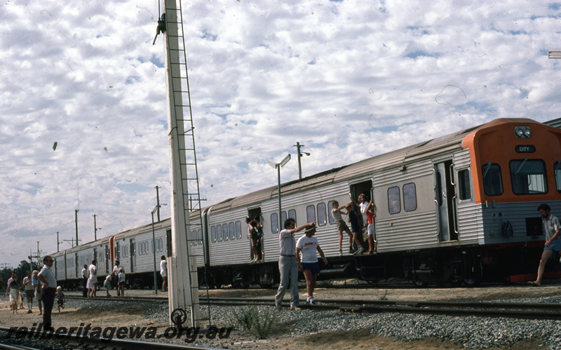 T05775
Four car ADL/ADC class railcar set, Kwinana yard, on an ARHS tour to Mundijong, view along the train with passengers wandering around the yard
