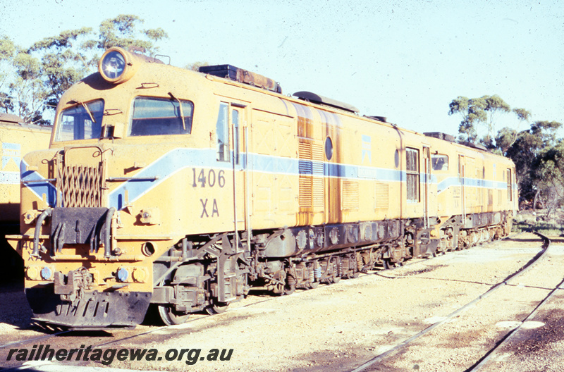 T05778
XA class 1406 coupled to another X type loco, Westrail orange livery with a blue stripe, front and side view
