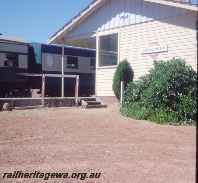 T05797
Station building, nameboard, Dwellingup, PN line, end view, tour train at the station.
