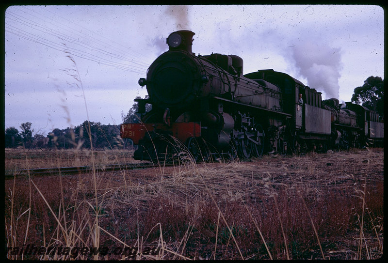 T06082
PMR Class 731 and PMR Class 721 double-heading No. 104 goods train for Collie, open wagons, 