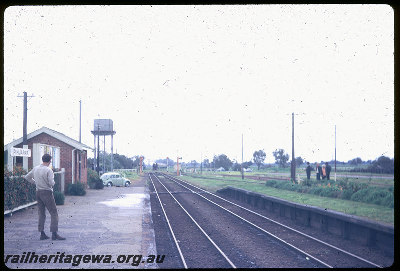 T06179
DM Class 587 and DD Class 592, ARHS tour train to Coolup, approaching Pinjarra, station nameboard, platform, toilet block, water tower, SWR line
