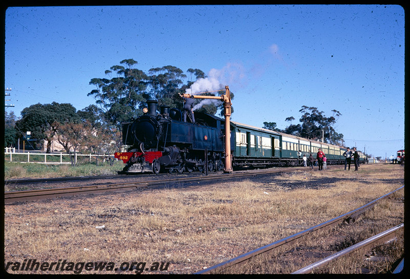 T06302
DD Class 592 on ARHS tour train, taking water at Armadale, returning to Perth after parallel run with NSWGR C38 Class 3801 on 