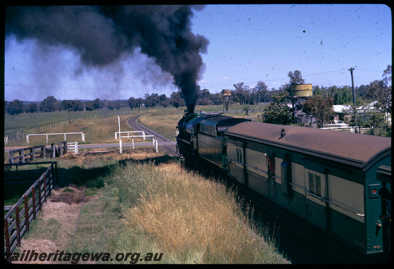T06616
V Class 1220, ARHS 75th tour train to Donnybrook, ZJ Class brakevan, Dardanup, Charlotte Street level crossing, raised points indicator, water tanks, PP line
