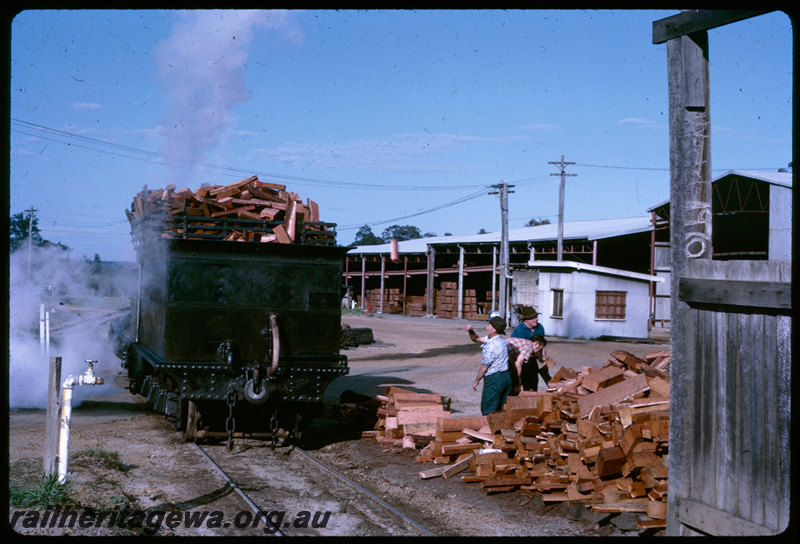 T06752
Millars loco No. 71, tender being loaded with wood, Yarloop, last steam locomotive in revenue service
